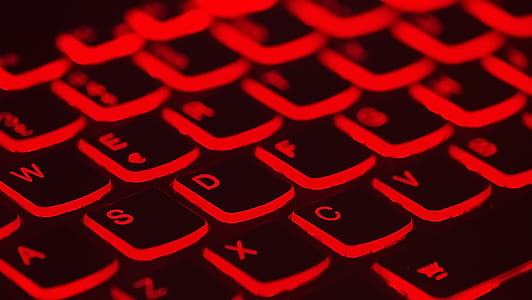 red and black back-lit computer keyboard thumbnail