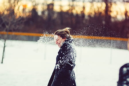 woman standing on snow thumbnail