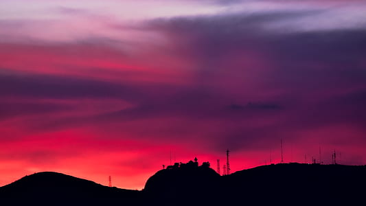 silhouette of mountain at golden hour thumbnail