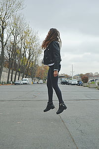 woman jumps at the street thumbnail