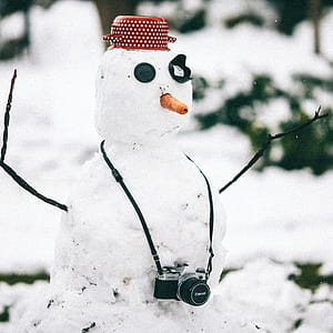 Snowman With Camera thumbnail