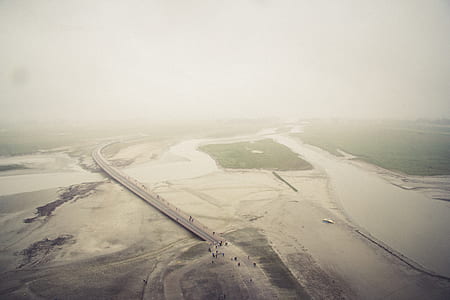 aerial photography of people crossing bridge thumbnail