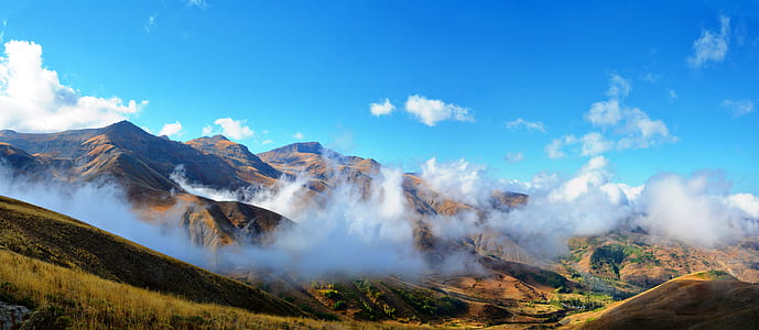 landscape photography of mountains during daytime thumbnail