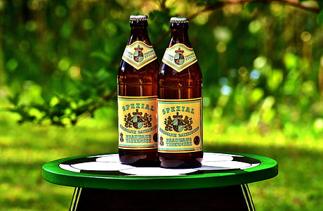 selective focus photography of two Spezial bottles thumbnail