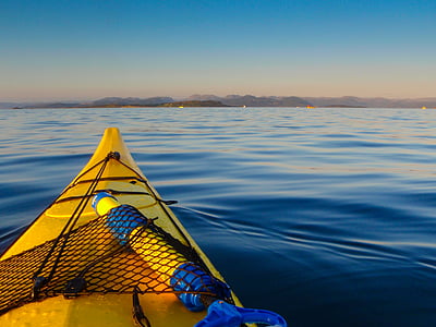 yellow kayak in water thumbnail