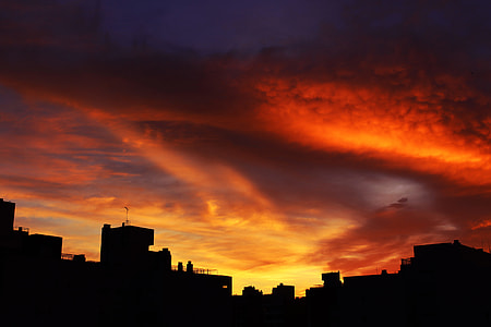 silhouette photo of building during golden hour thumbnail