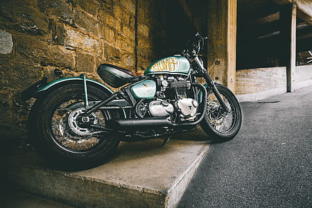 Photo of Motorcycle Parked On Pavement thumbnail