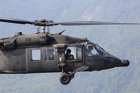 man riding helicopter thumbnail