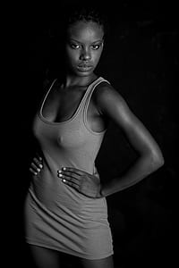 woman standing holding waist thumbnail
