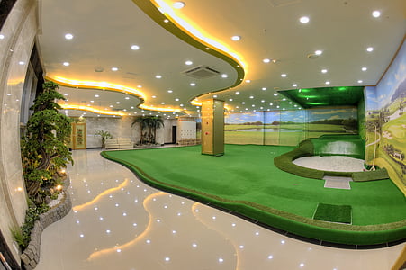 lighted ceiling and green golf mat field thumbnail