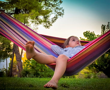 girl on hammock above turf thumbnail