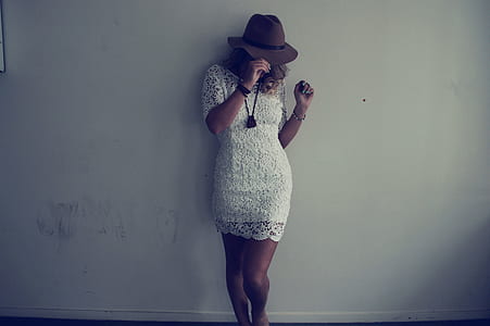 woman standing on wall thumbnail
