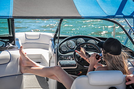 woman driving boat thumbnail