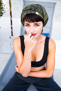 woman in blue crop-top thumbnail