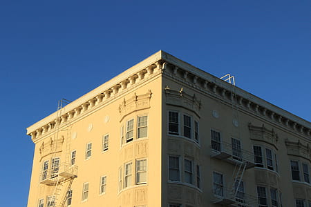 yellow concrete building thumbnail