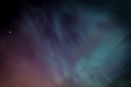 Stars and Northern Lights in the night sky thumbnail