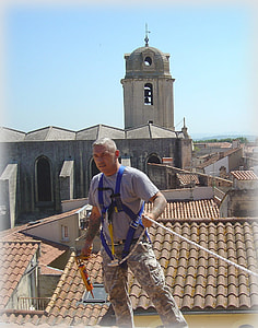 man in grey top wearing harness thumbnail