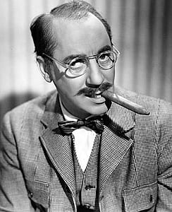 grayscale photo of man with tobacco and eyeglasses thumbnail