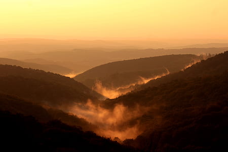top view photography of brown hills at golden hour thumbnail