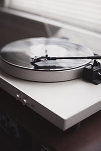 tilt-shift photography of white turntable thumbnail