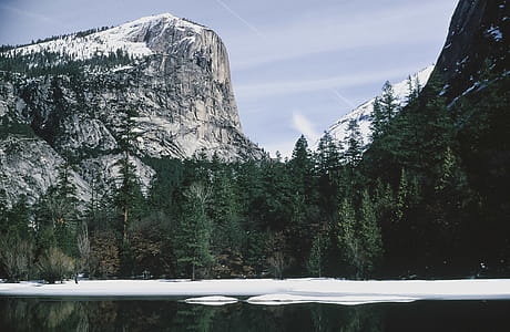 Half Dome Rock reflection on frozen Mirror Lake, Yosemite National Park thumbnail