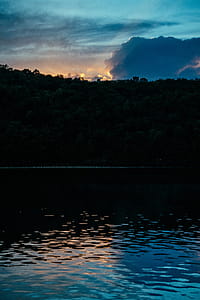 Sunset Over Forest Photo thumbnail