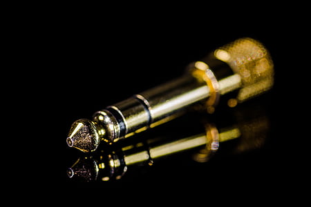brass-colored audio jack pin thumbnail