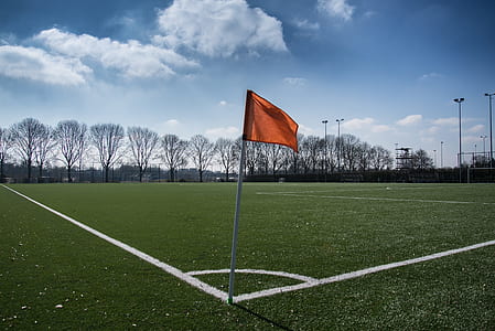 orange flag on sports field thumbnail
