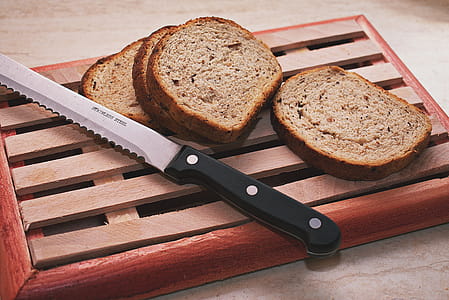 Slices Of Bread Beside Knife thumbnail