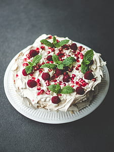 strawberry cake with icing on plate thumbnail