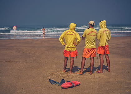 three lifeguard at beach thumbnail