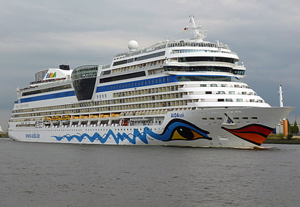 white cruiser ship on body of water during daytime thumbnail