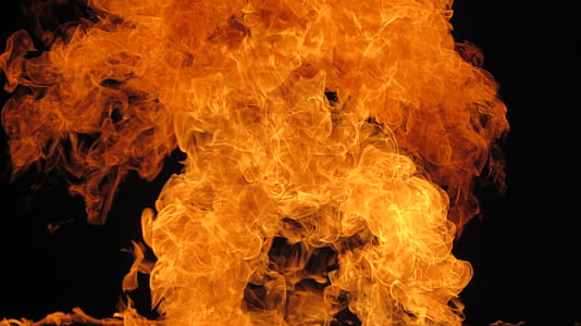 time lapse photography of orange flame with black background thumbnail