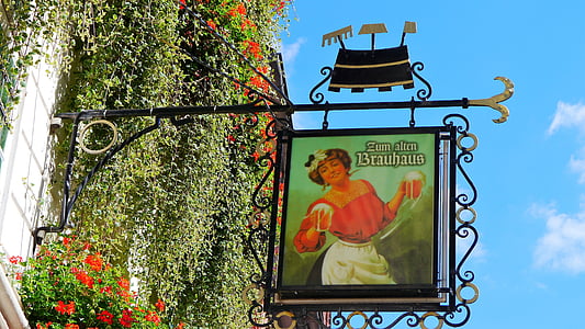 woman holding beer glasses signage thumbnail