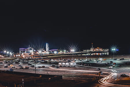 time lapse photo of road during night time thumbnail