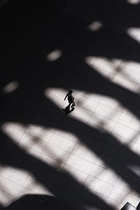 person walking outdoor during daytime thumbnail
