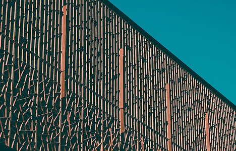 black and brown metal fence at daytime thumbnail