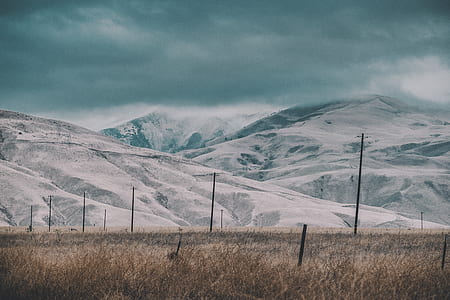 landscape photography of snowy hill at daytie thumbnail