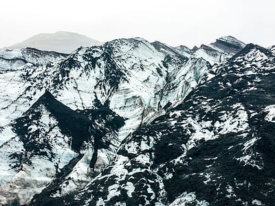 closeup photo of mountain covered with snow thumbnail