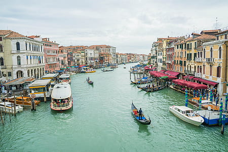 body of water and boats during daytime thumbnail