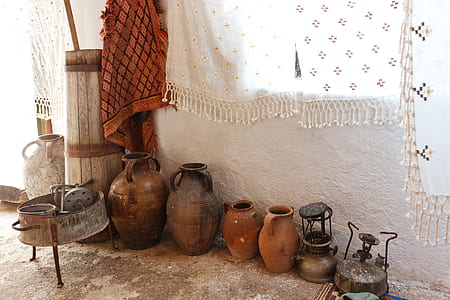 several jars near white painted wall thumbnail