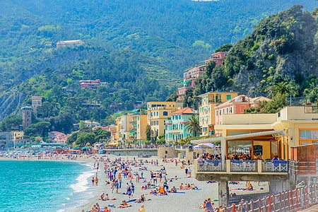 group of people standing on shore thumbnail