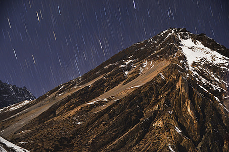 mountain under space clouds thumbnail