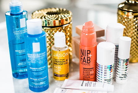 assorted plastic bottles on white surface thumbnail