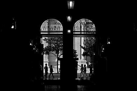 silhouette photography of building door thumbnail