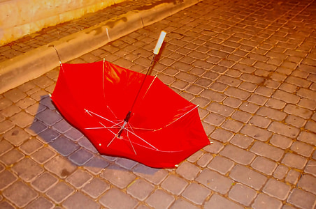 red umbrella on gray ground thumbnail