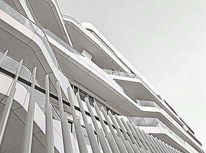 low angle photography of white concrete building thumbnail