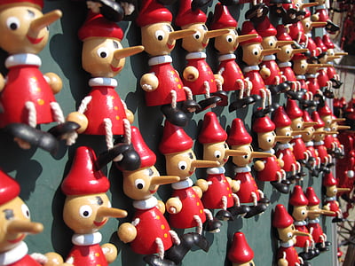 red and brown wooden marionette thumbnail