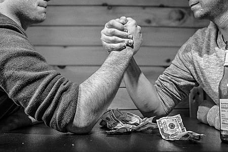 gray scale two man arm wrestling thumbnail