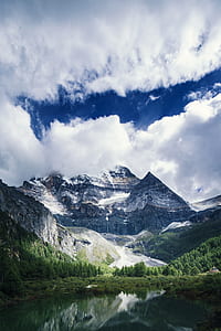 mountain range under clouds thumbnail